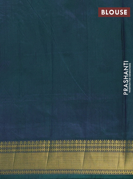 Semi tussar saree cs blue and bottle green with allover ikat butta prints and zari woven border
