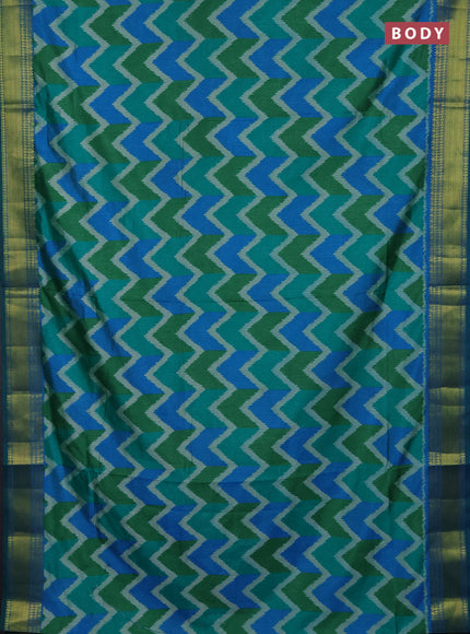 Semi tussar saree cs blue and green with allover zigzag ikat prints and zari woven border