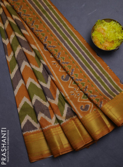 Semi tussar saree mehendi green and mustard yellow with allover zigzag ikat prints and zari woven border