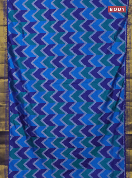 Semi tussar saree multi colour and blue with allover zigzag ikat prints and zari woven border