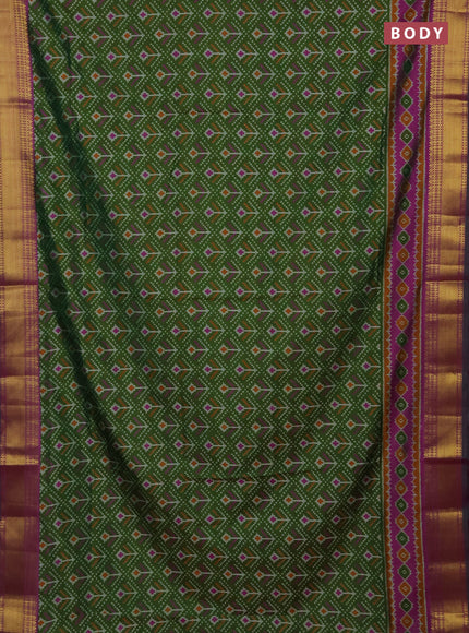 Semi tussar saree mehendi green and purple with allover ikat butta prints and zari woven border