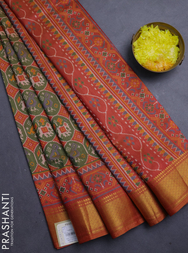 Semi tussar saree mehendi green and dark mustard with allover patola prints and zari woven border