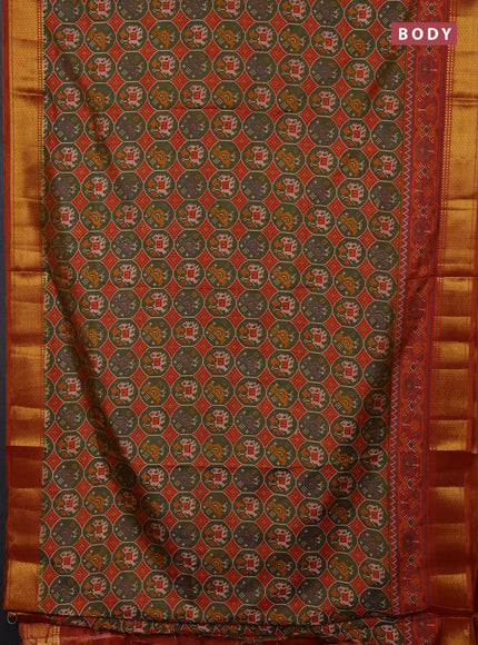 Semi tussar saree mehendi green and dark mustard with allover patola prints and zari woven border