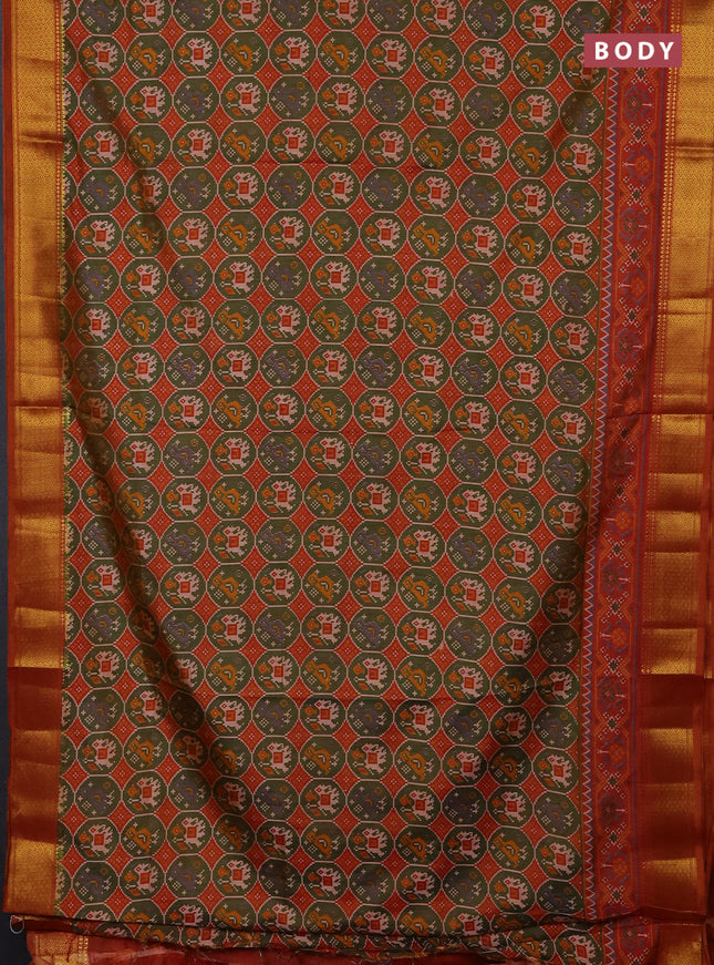 Semi tussar saree mehendi green and dark mustard with allover patola prints and zari woven border