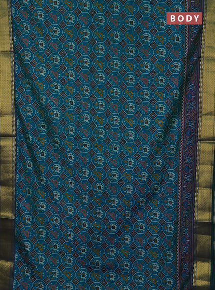 Semi tussar saree teal green and bottle green with allover patola prints and zari woven border
