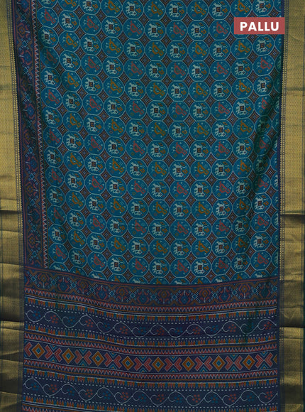 Semi tussar saree teal green and bottle green with allover patola prints and zari woven border