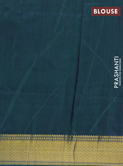 Semi tussar saree teal green and bottle green with allover patola prints and zari woven border
