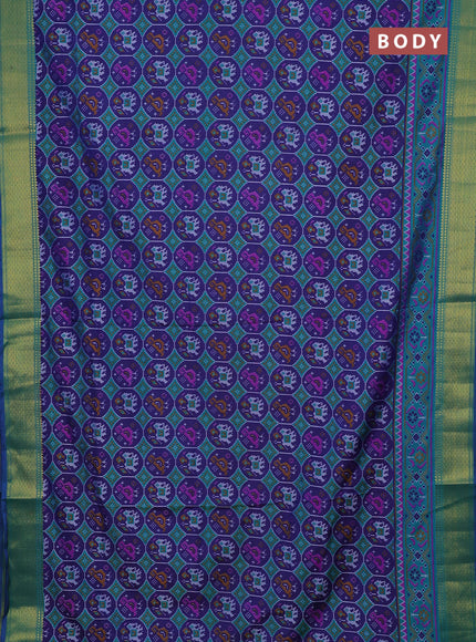 Semi tussar saree blue and teal green with allover patola prints and zari woven border