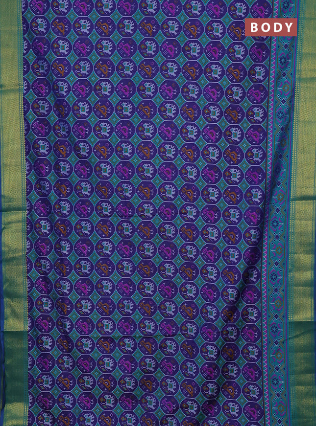 Semi tussar saree blue and teal green with allover patola prints and zari woven border