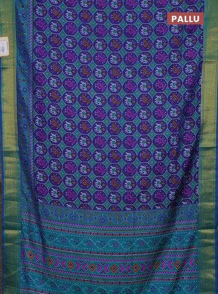 Semi tussar saree blue and teal green with allover patola prints and zari woven border