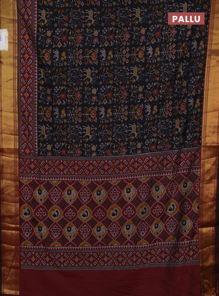 Semi tussar saree black and maroon with allover patola prints and zari woven border