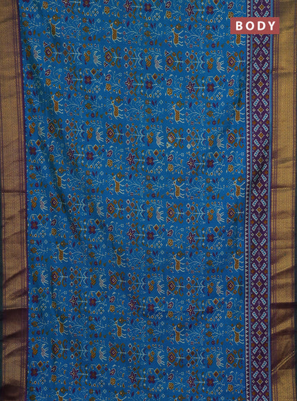 Semi tussar saree teal blue and purple with allover patola prints and zari woven border
