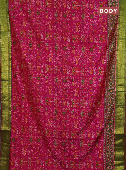 Semi tussar saree pink and green with allover patola prints and zari woven border