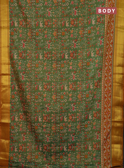 Semi tussar saree mehendi green and dark mustard with allover patola prints and zari woven border