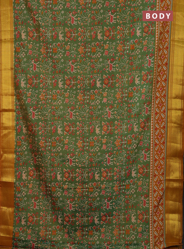 Semi tussar saree mehendi green and dark mustard with allover patola prints and zari woven border