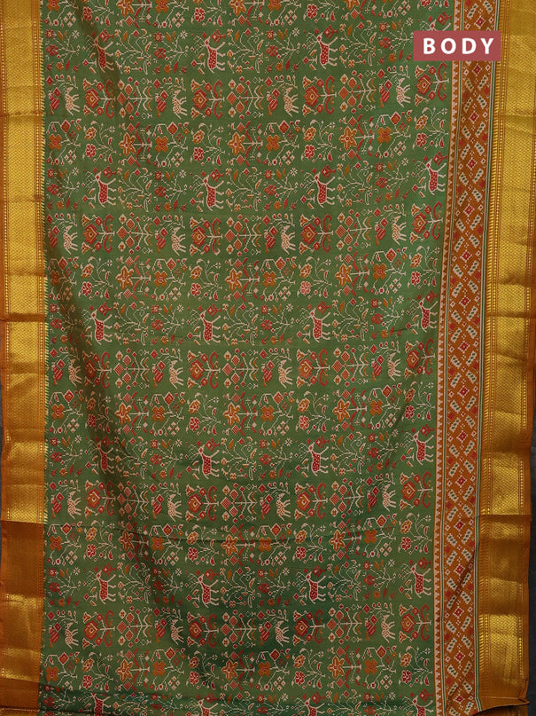 Semi tussar saree mehendi green and dark mustard with allover patola prints and zari woven border