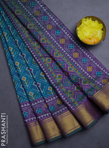 Semi tussar saree teal green and deep purple with allover ikat weaves and ikat zari woven border