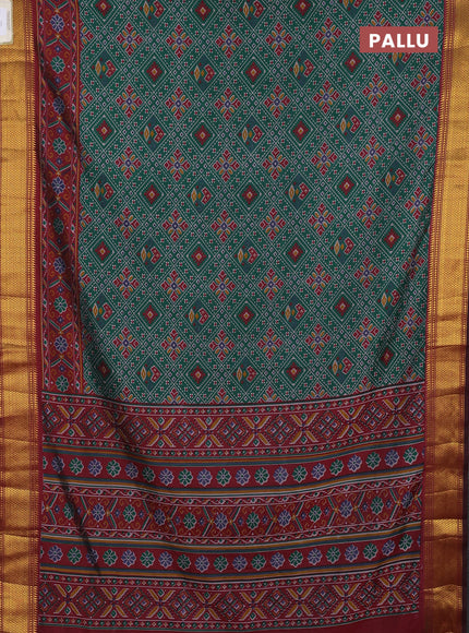Semi tussar saree bottle green and dark maroon with allover ikat weaves and ikat zari woven border