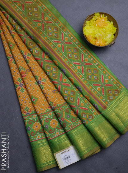 Semi tussar saree mustard yellow and light green with allover ikat weaves and ikat zari woven border