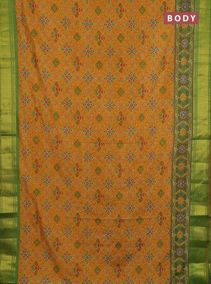 Semi tussar saree mustard yellow and light green with allover ikat weaves and ikat zari woven border