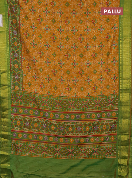 Semi tussar saree mustard yellow and light green with allover ikat weaves and ikat zari woven border