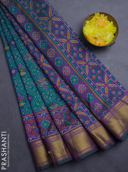 Semi tussar saree teal green and purple with allover ikat weaves and ikat zari woven border