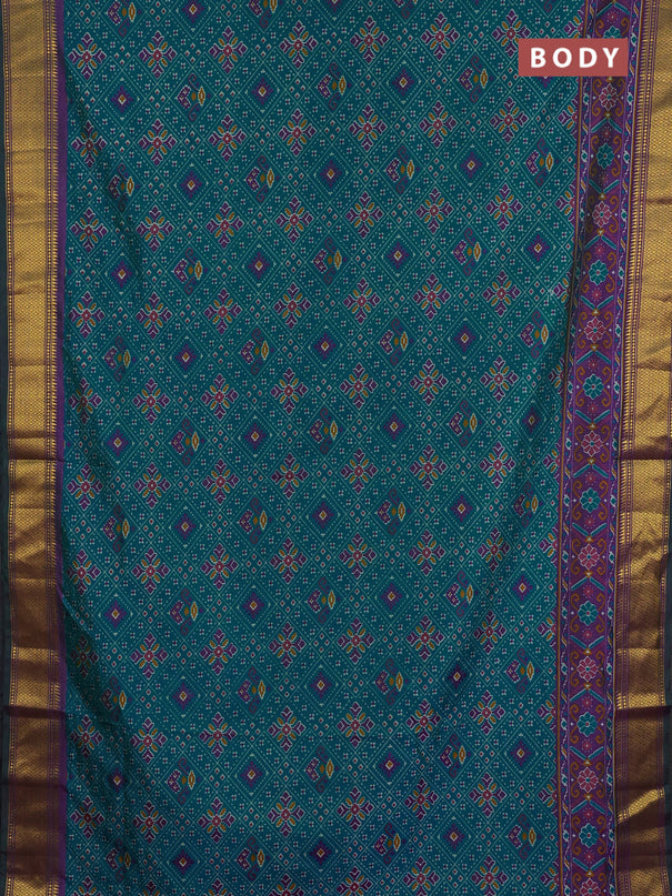 Semi tussar saree teal green and purple with allover ikat weaves and ikat zari woven border