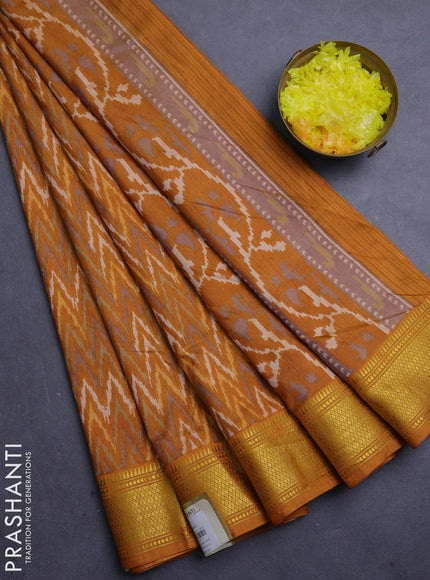 Semi tussar saree dark mustard with allover zigzag ikat prints and zari woven border