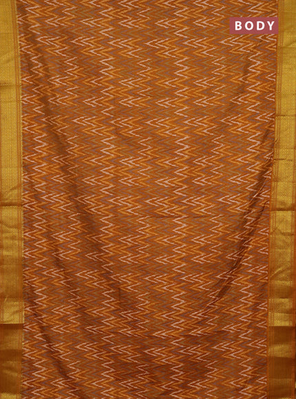 Semi tussar saree dark mustard with allover zigzag ikat prints and zari woven border