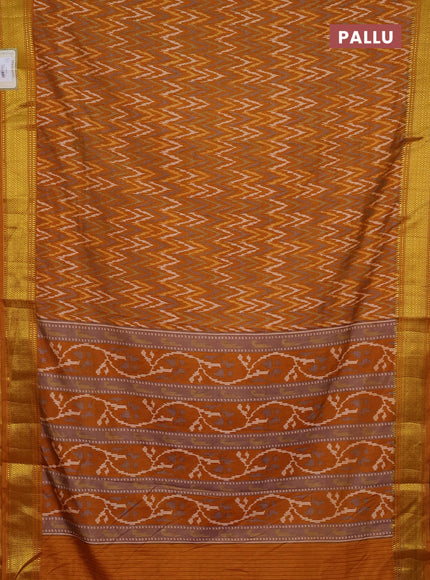 Semi tussar saree dark mustard with allover zigzag ikat prints and zari woven border