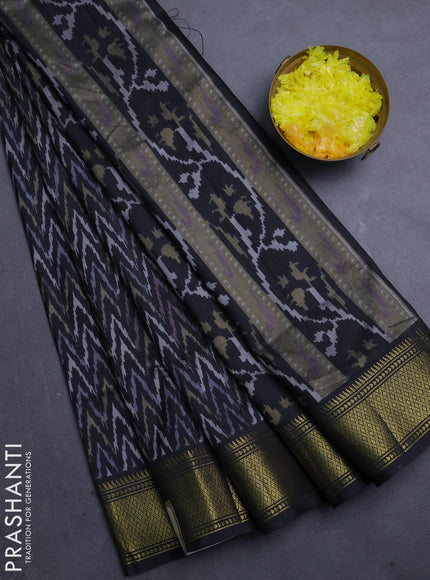 Semi tussar saree black with allover zigzag ikat prints and zari woven border
