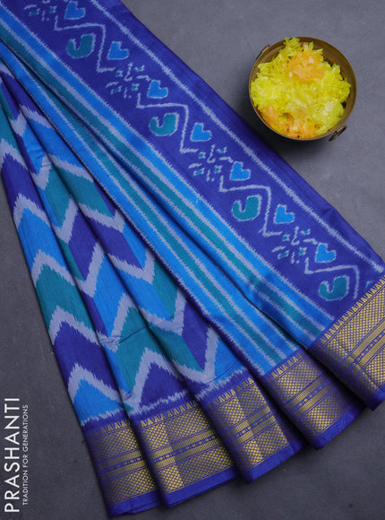 Semi tussar saree blue and royal blue with allover zigzag ikat prints and zari woven border