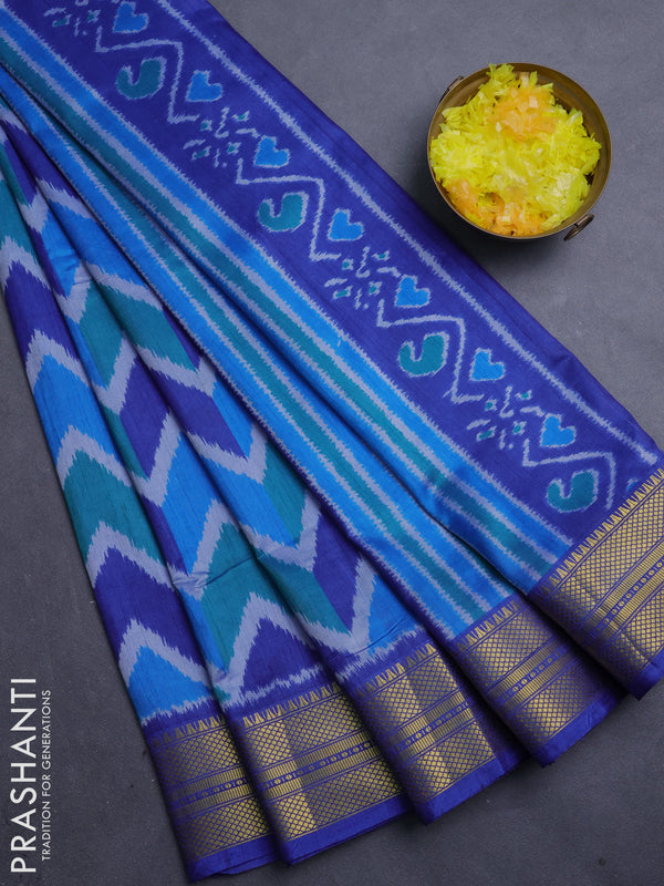 Semi tussar saree blue and royal blue with allover zigzag ikat prints and zari woven border