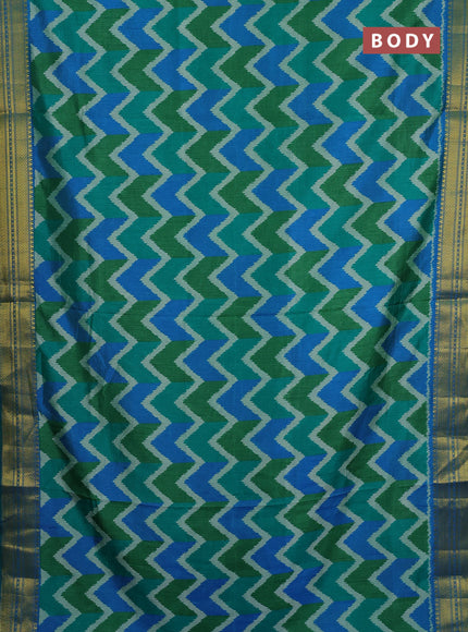 Semi tussar saree green and teal blue with allover zigzag ikat prints and zari woven border