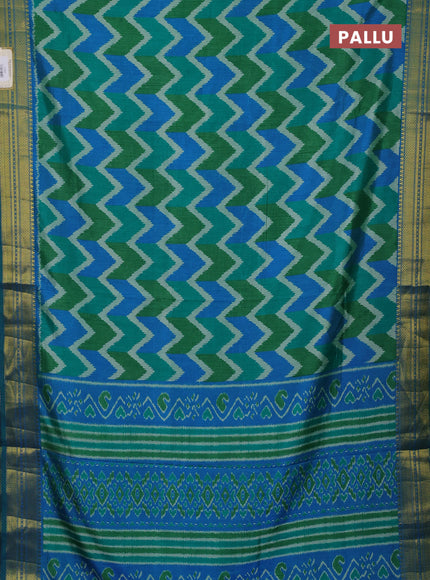 Semi tussar saree green and teal blue with allover zigzag ikat prints and zari woven border