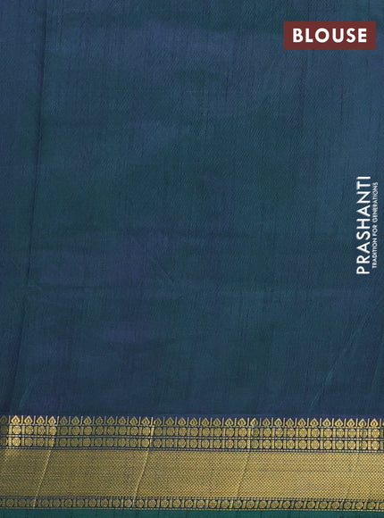 Semi tussar saree teal green and bottle green with allover patola prints and zari woven border