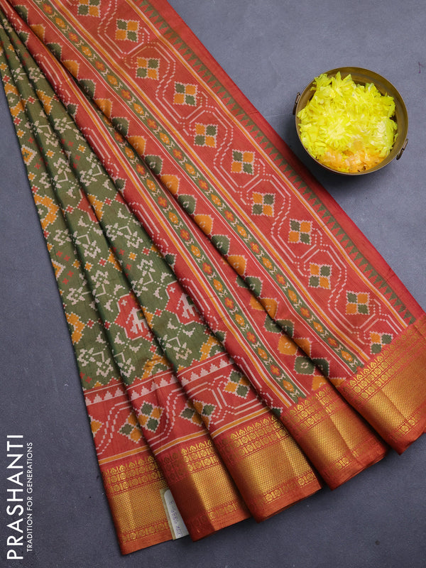 Semi tussar saree mehendi green and rust orange with allover patola prints and zari woven border