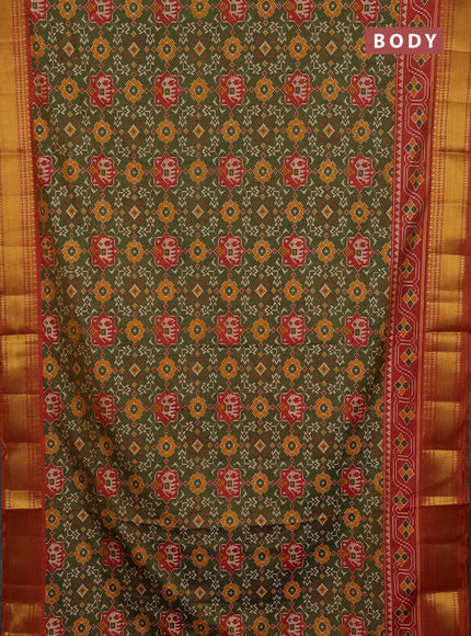 Semi tussar saree mehendi green and rust orange with allover patola prints and zari woven border