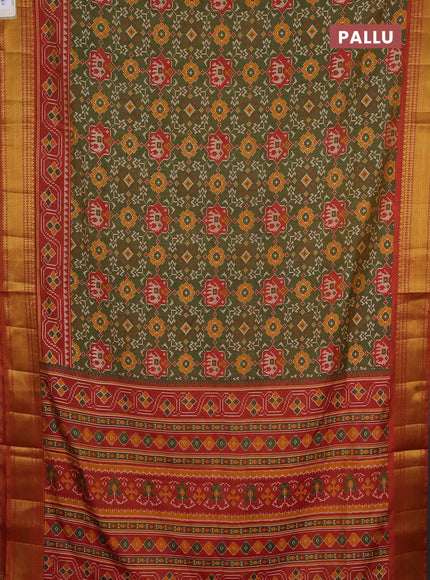 Semi tussar saree mehendi green and rust orange with allover patola prints and zari woven border