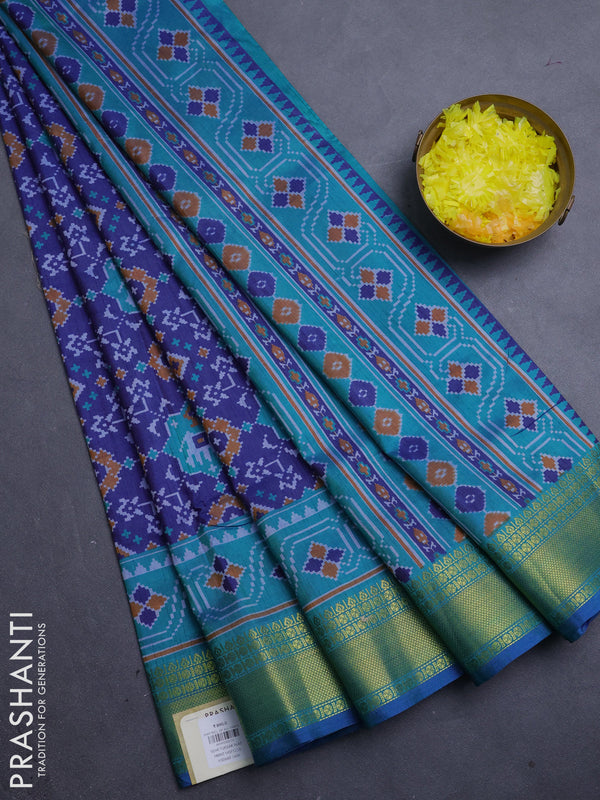 Semi tussar saree blue and teal green with allover patola prints and zari woven border