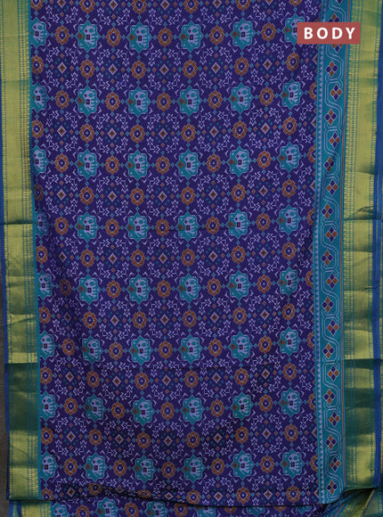 Semi tussar saree blue and teal green with allover patola prints and zari woven border