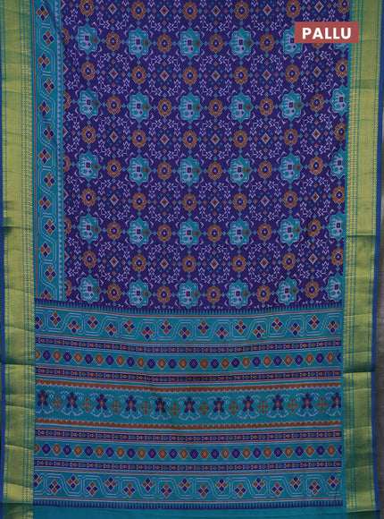 Semi tussar saree blue and teal green with allover patola prints and zari woven border