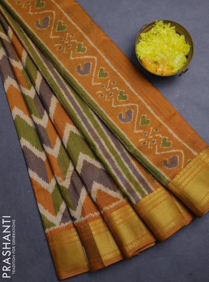 Semi tussar saree mehendi green and rust shade with allover zigzag ikat prints and zari woven border