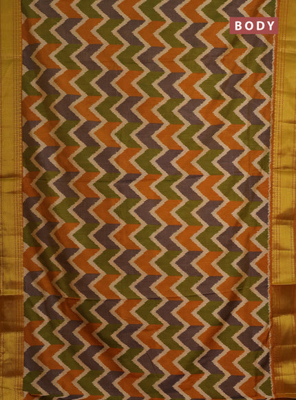 Semi tussar saree mehendi green and rust shade with allover zigzag ikat prints and zari woven border