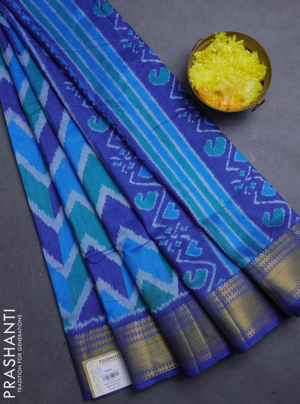 Semi tussar saree blue and royal blue with allover zigzag ikat prints and zari woven border