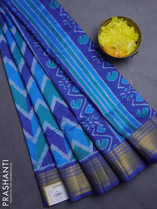 Semi tussar saree blue and royal blue with allover zigzag ikat prints and zari woven border