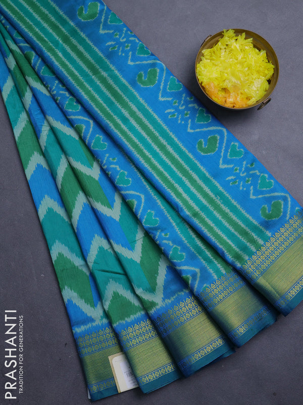 Semi tussar saree green and teal blue with allover zigzag ikat prints and zari woven border