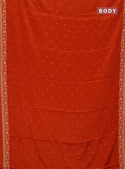 Semi mysore silk saree rustic orange with allover zari woven buttas and zari woven border