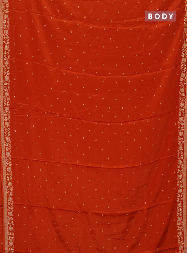 Semi mysore silk saree rustic orange with allover zari woven buttas and zari woven border