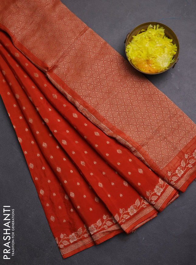 Semi mysore silk saree rust shade with allover zari woven buttas and zari woven border